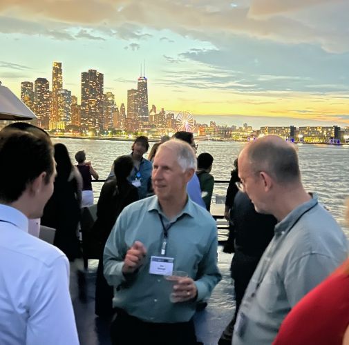 The conference committee was chaired by TC affiliate Professor Ian Savage (center) 
